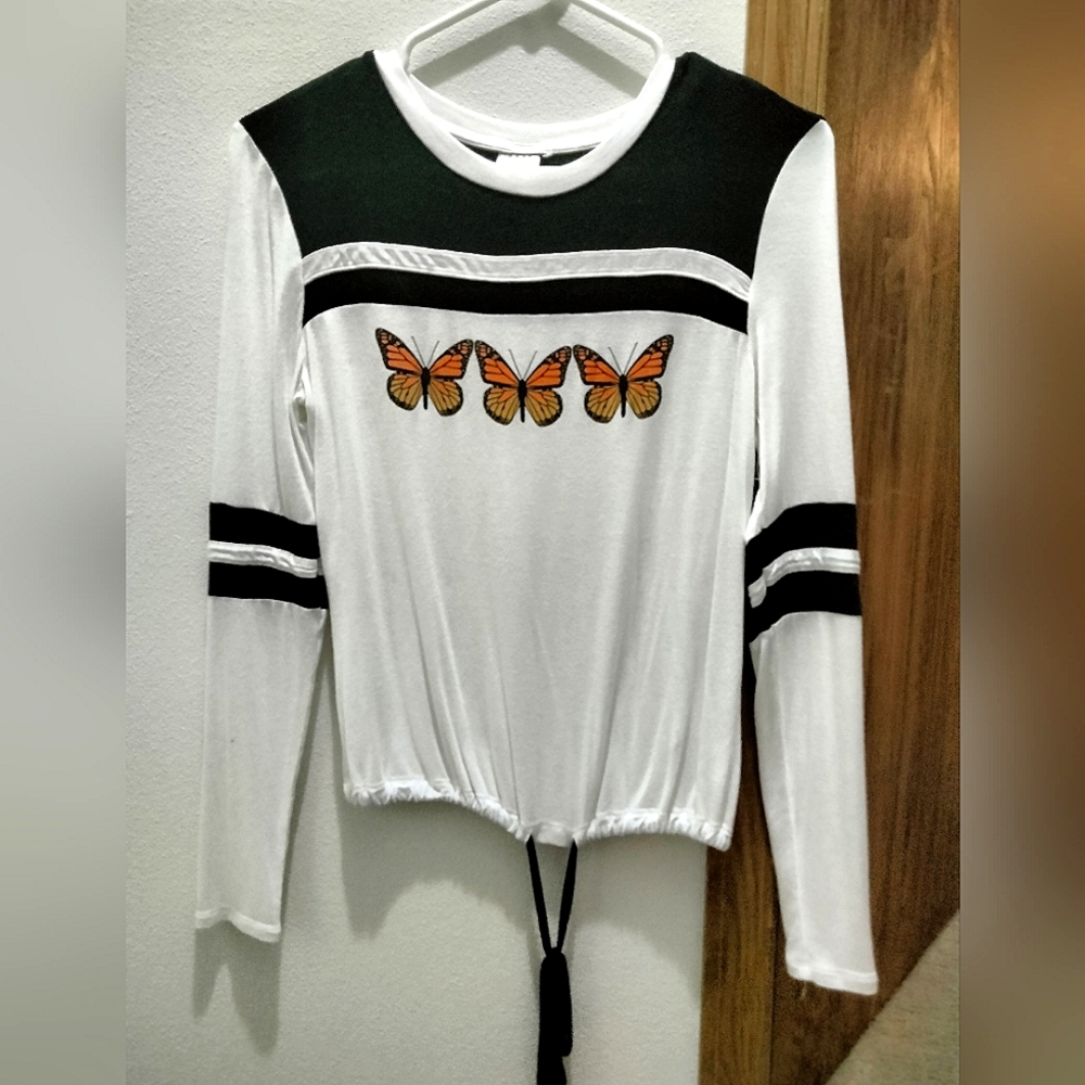 A small (3-5), No Boundaries, White t-shirt with orange butterfly details.